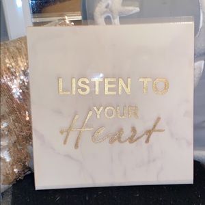 White and gold wall decor